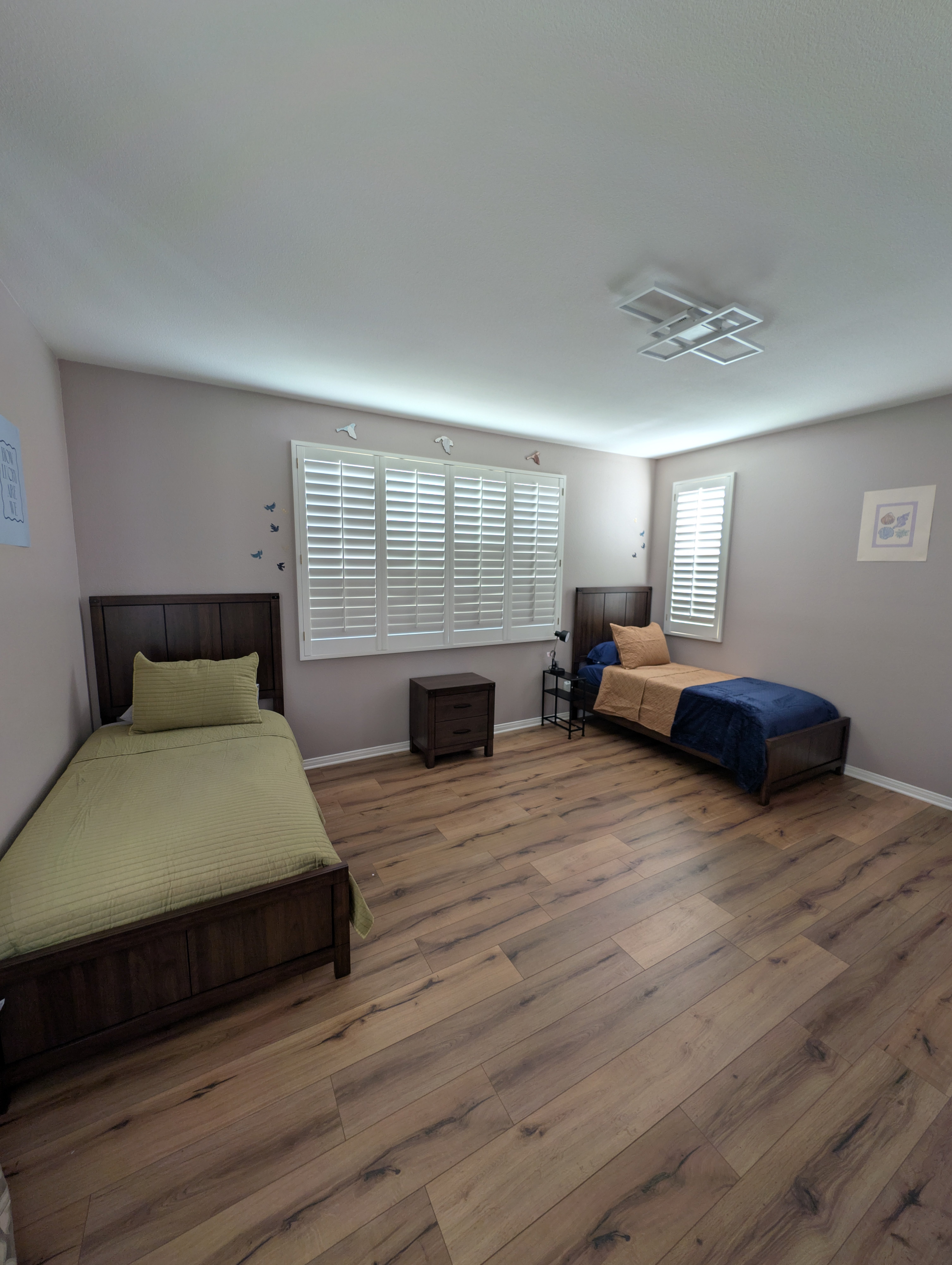 Bedroom 4 overview with two beds — Soleil Levant Care